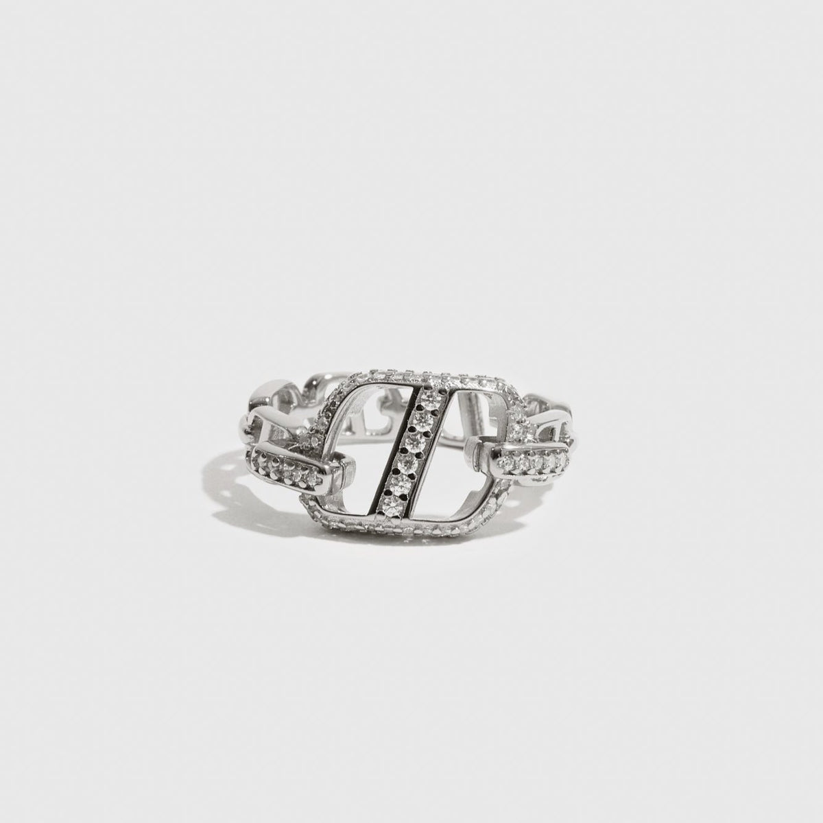 Sterling silver 925 monogram ring with cubic zirconia, shown on a plain background.